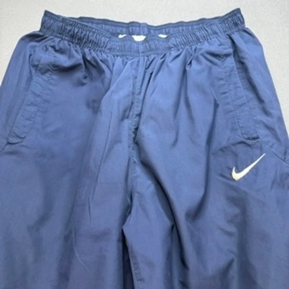 Nike Loose Fit Track Pants Mens Navy Blue White Side Stripe Mesh Lined Athletic